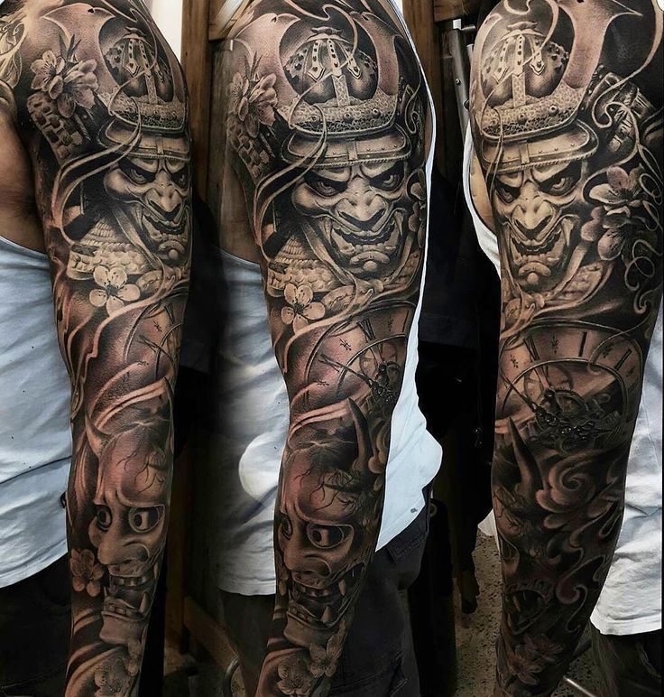 Black And Grey Asian Warrior Tattoo On Left Full Sleeve