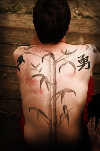 Black And Grey Bamboo Trees Tattoo On Man Full Back