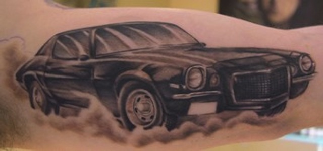 Black And Grey Camaro Car Tattoo On Half Sleeve