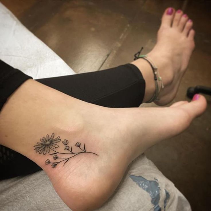Black And Grey Flowers Tattoo On Ankle
