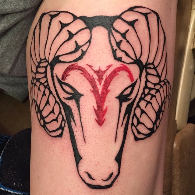 Black And Red Aries Head Tattoo On Sleeve