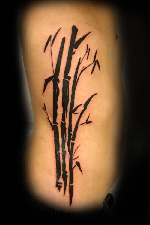 Black Bamboo Tree Tattoo On Right Side Rib