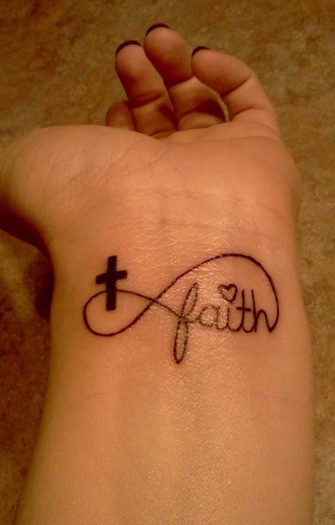 Black Cross With Infinity And Faith Lettering Tattoo On Left Wrist