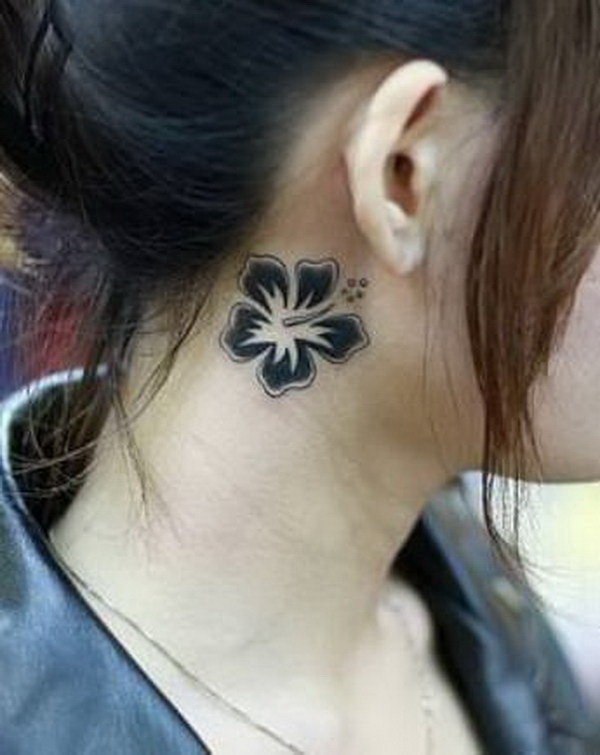 Black Hibiscus Tattoo On Right Behind The Ear