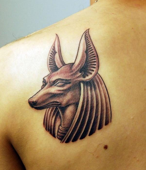 Black Ink Anubis Head Tattoo On Man Left Back Shoulder