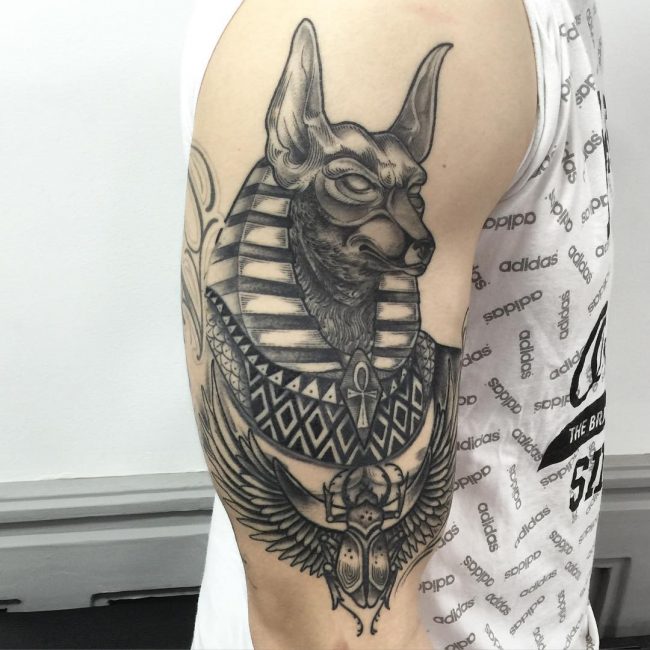 Black Ink Anubis Tattoo On Right Half Sleeve