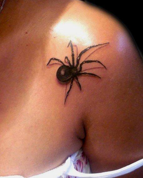 Black Ink Arachnids Tattoo On Left Front Shoulder