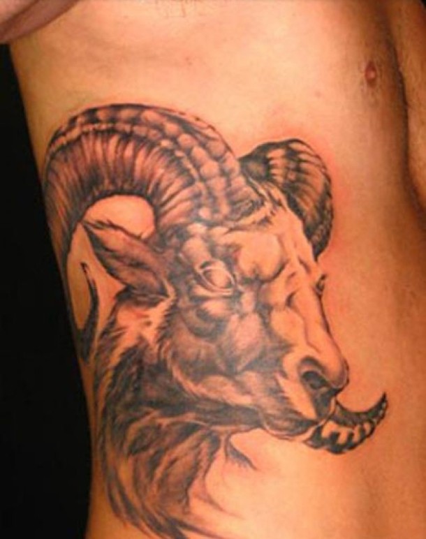 Black Ink Aries Head Tattoo On Man Right Side Rib