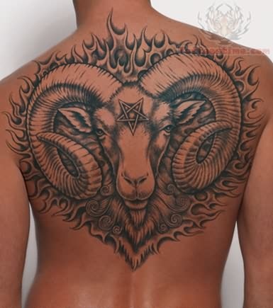Black Ink Aries Head Tattoo On Man Upper Back