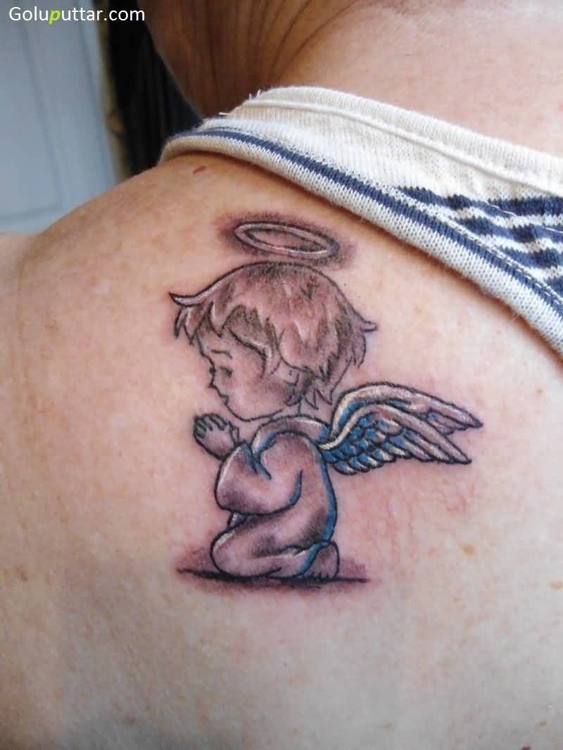 Black Ink Baby Angel Tattoo On Left Back Shoulder