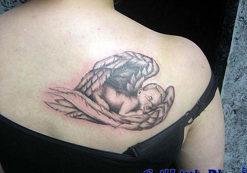 Black Ink Baby Angel Tattoo On Right Back Shoulder