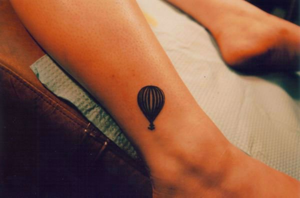 Black Ink Balloon Tattoo On Right Leg