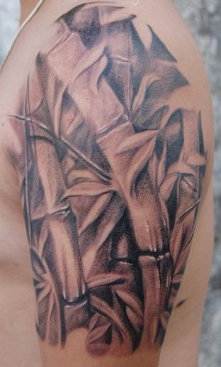 Black Ink Bamboo Tree Tattoo On Left Half Sleeve