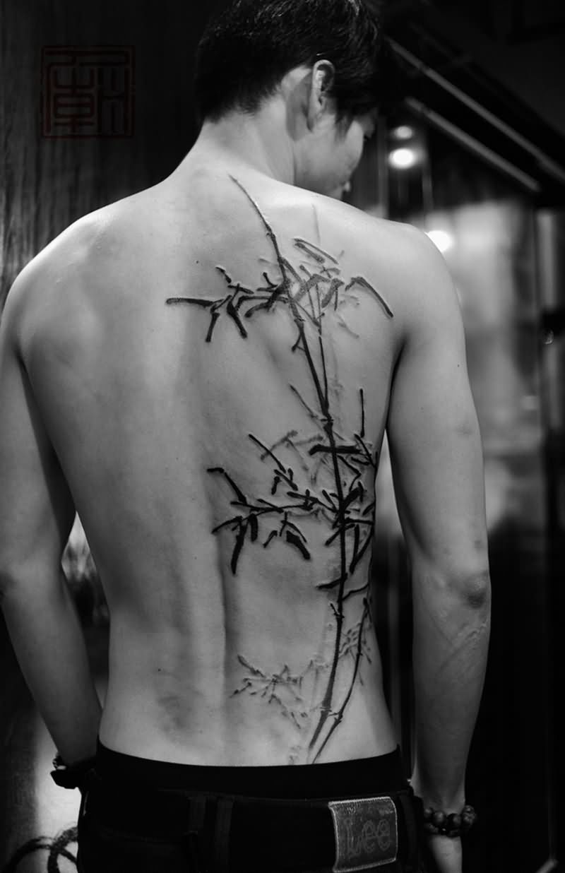 Black Ink Bamboo Tree Tattoo On Man Full Back
