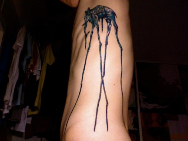 Black Ink Dali Elephant Tattoo On Left Side Rib