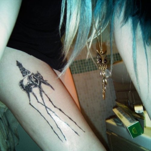 Black Ink Dali Elephant Tattoo On Right Thigh