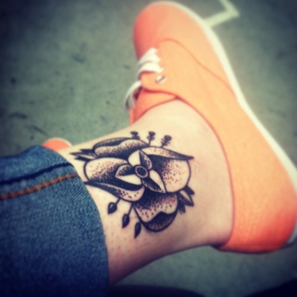 Black Ink Dotwork Flower Tattoo On Ankle