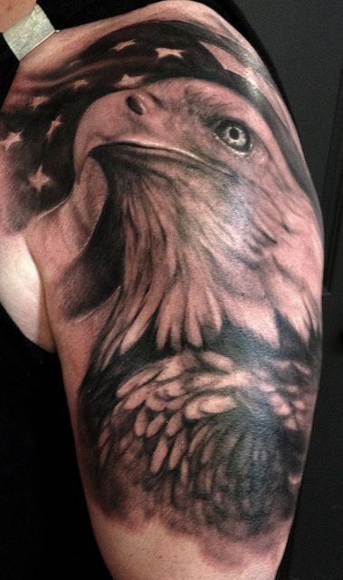 Black Ink Eagle Head Tattoo On Left Shoulder