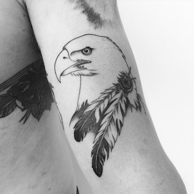 Black Ink Eagle With Feather Tattoo On Forearm