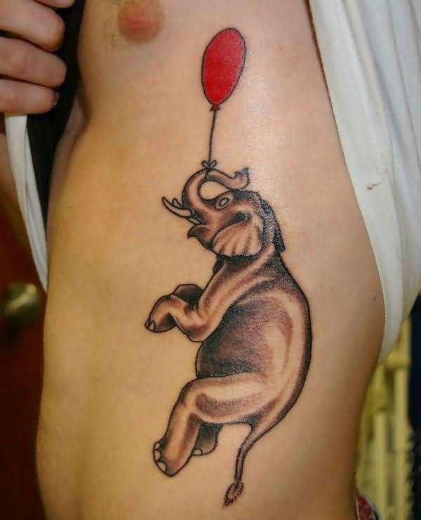 Black Ink Elephant With Red Balloon Tattoo On Man Left Side Rib