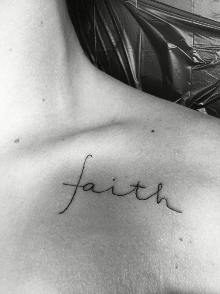 Black Ink Faith Lettering Tattoo On Left Front Shoulder