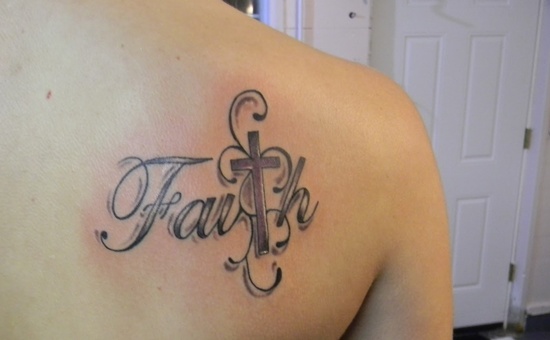 Black Ink Faith Lettering With Cross Tattoo On Right Back Shoulder