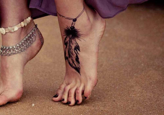 Black Ink Feather Tattoo On Girl Left Foot