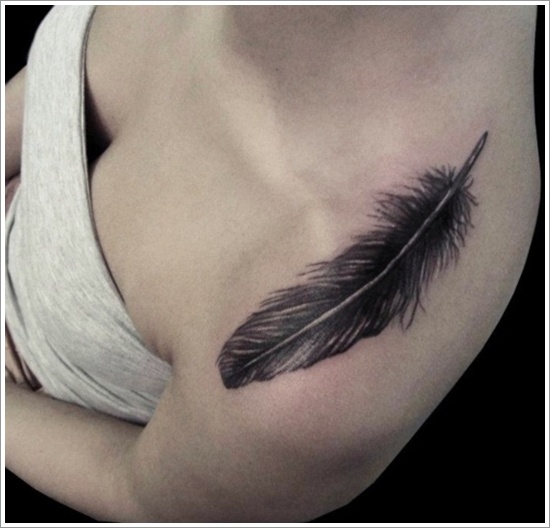 Black Ink Feather Tattoo On Left Shoulder