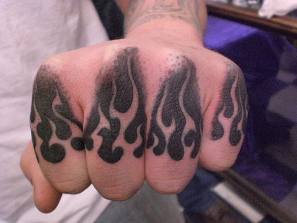 Black Ink Fire And Flame Tattoo On Left Hand Fingers