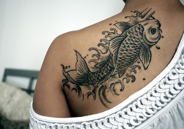 Black Ink Fish Tattoo On Left Back Shoulder