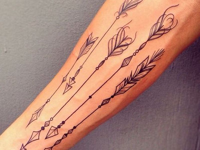 Black Ink Five Arrows Tattoo On Right Forearm