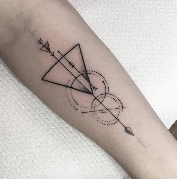 Black Ink Geometric Arrow Tattoo On Forearm