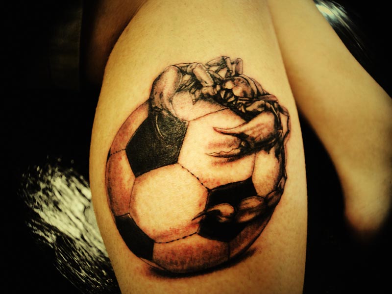 Black Ink Scorpion On Football Tattoo On Leg Calf
