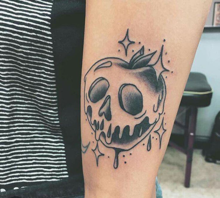 Black Ink Skull Apple Tattoo On Left Forearm