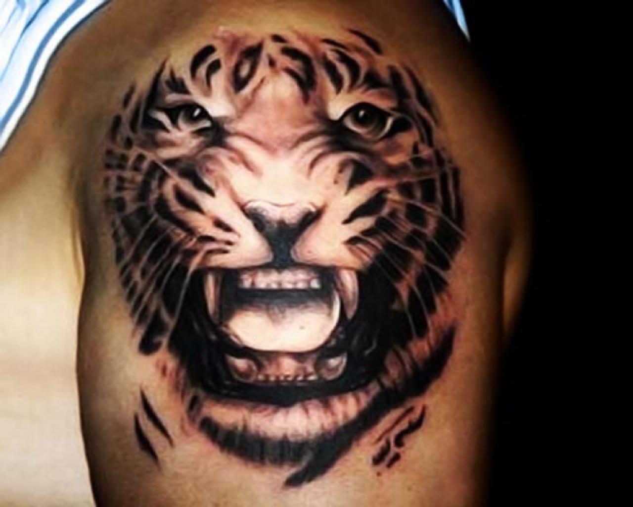 Black Ink Tiger Head Tattoo On Left Shoulder