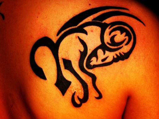 Black Outline Aries Tattoo On Right Back Shoulder