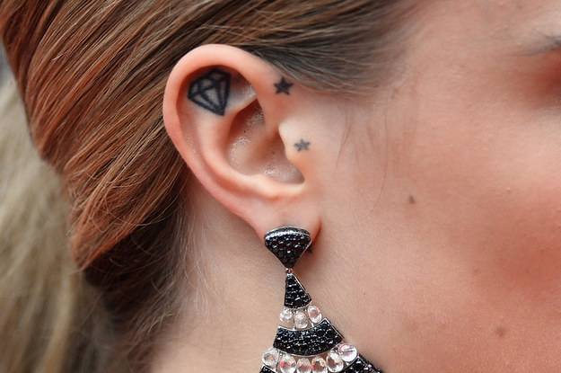 Black Outline Diamond Tattoo On Right Ear