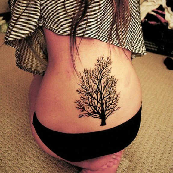 Black Tree Without Leaves Tattoo On Women Lower Back