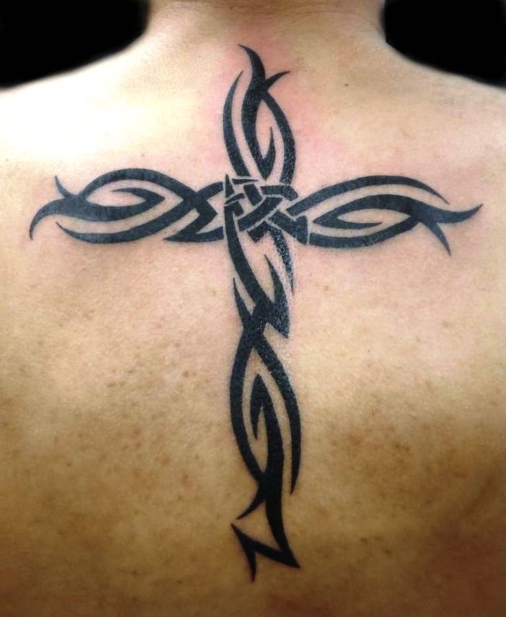 Black Tribal Cross Tattoo On Man Upper Back