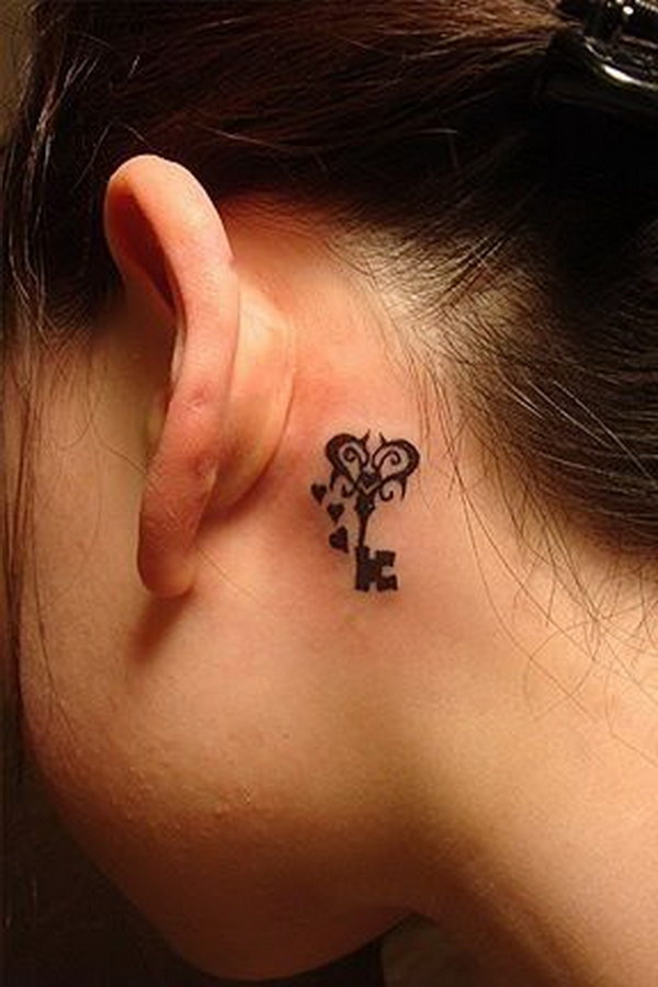 Black Tribal Heart Key Tattoo On Left Behind The Ear