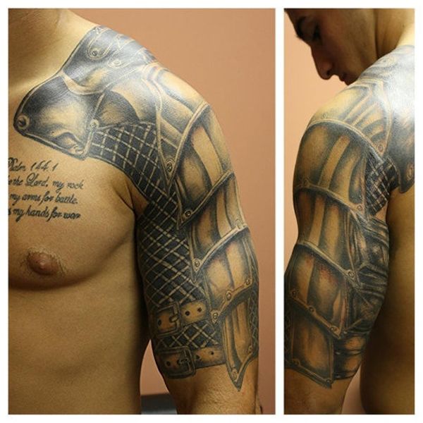 Classic Black And Grey Armor Tattoo On Man Left Half Sleeve