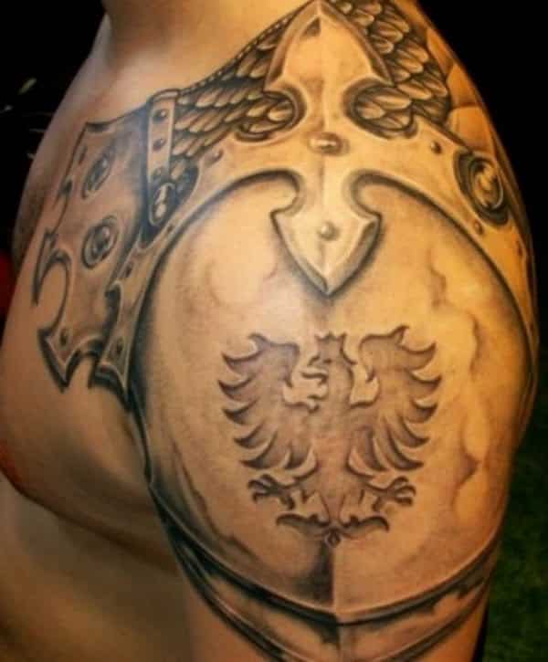 Classic Grey Ink Armor Tattoo On Man Left Shoulder