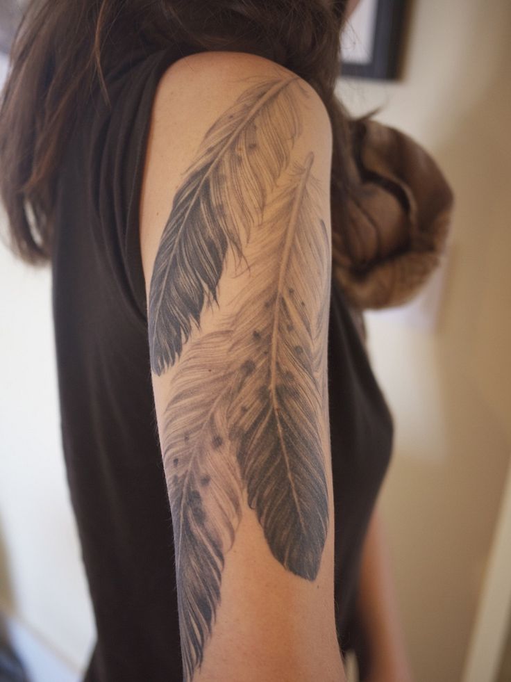 Classic Grey Ink Feathers Tattoo On Women Right Upper Arm