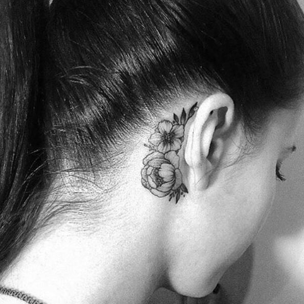 Classic Grey Ink Flowers Tattoo On Girl Right Behind The Ear