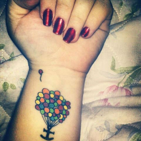 Colorful Balloons With Anchor Tattoo On Girl Left Wrist