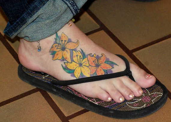Colorful Flowers Tattoo On Right foot