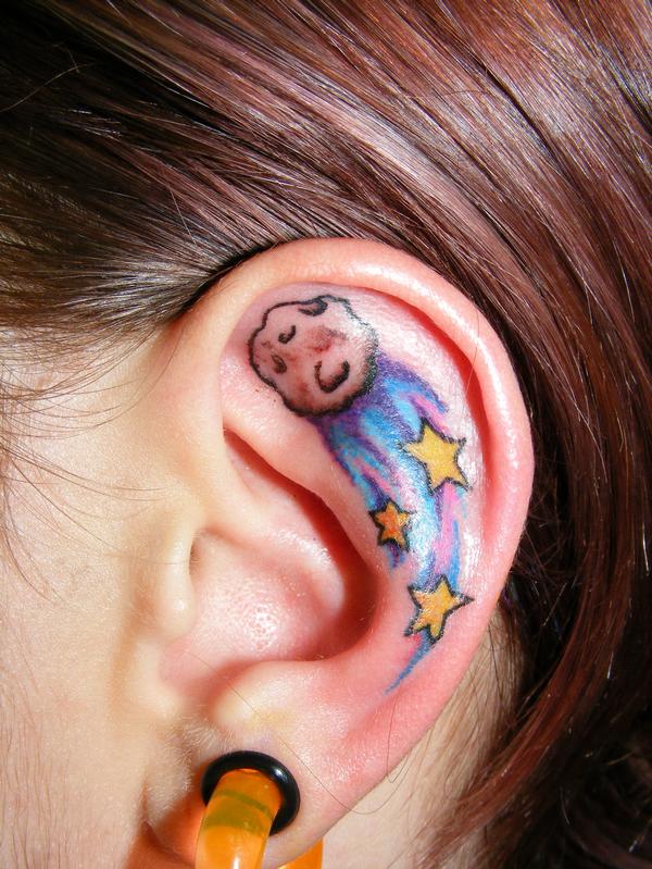 Colorful Stars Tattoo On Girl Left Ear