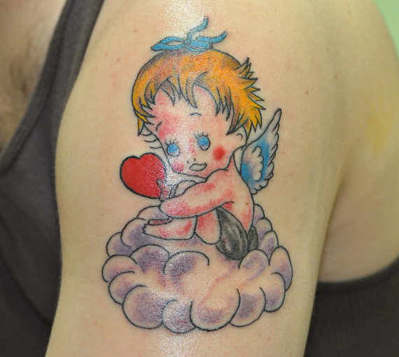 Colorful Traditional Baby Angel Tattoo On Left Shoulder