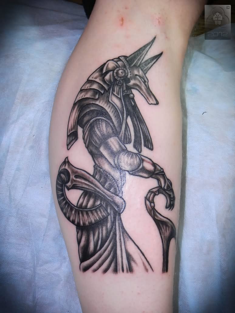 Cool Black Ink Anubis Tattoo On Leg Calf