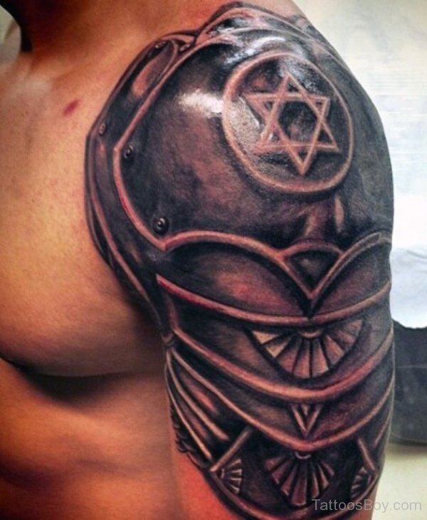 Cool Black Ink Armor Tattoo On Man Left Shoulder